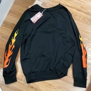 black crew neck with flames on sleeves
